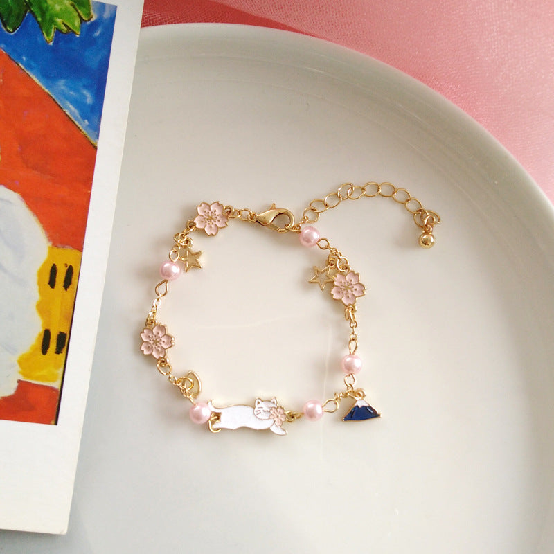 Pulsera de aleación de perlas de flor Fuji de montaje de aceite al por mayor